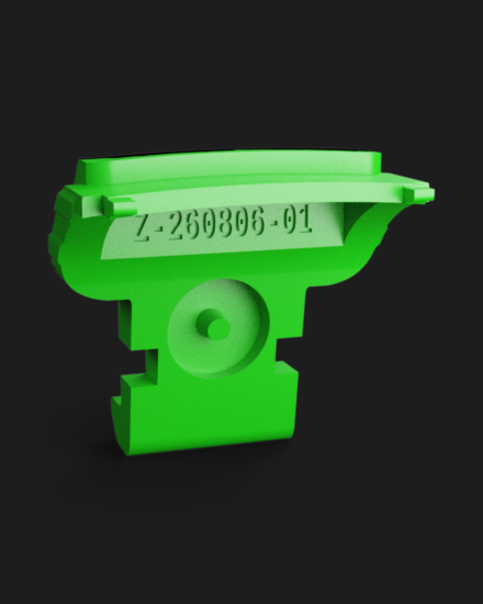 Green Z Battery Button for a DeWalt 18V battery showing its engraved Trace ID